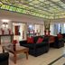 Meliá Paris Vendôme lobby in Paris with stained-glass ceiling and black sofas