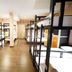 Urban Hostel Bangkok dorm room with multiple bunk beds and wood flooring in Bangkok