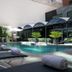 Regal Pacific Puerto Madero in Buenos Aires, outdoor pool with loungers and rolled towels