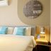 Home Inn Neo Wuxi Xihu East Road Dongting guest room with double bed and wall-mounted AC, Wuxi