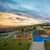 Centara Mirage Resort Mui Ne in Phan Thiet with a colorful kids' playground at sunset
