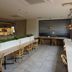 Sakai Sun Hotel Ishizugawa in Sakai dining area with long communal table and chairs