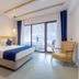 Baldan Suites Hotel & Restaurant room in Bozburun with king bed, blue accents and balcony view