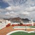 Aparthotel Vistamar in San José rooftop terrace with mini golf and ocean views