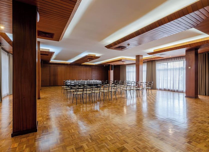 Nova Cruz Hotel in Santa Maria da Feira meeting room with polished wooden floor and rows of chairs