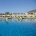 Golden Coast Hotel & Bungalows in Marathon with a large blue pool and seaside bungalow views