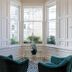The Lane Hotel Edinburgh lounge with bay windows, teal chairs and patterned floor