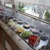 Canada Hotel & Bungalows in Cirali buffet counter with salads, fruit, plates, and poolside view