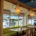 The Ritz Hotel at Garden Oases in Davao City dining area with long table seating and hanging pendant lights