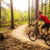 North Creek Lodge at Gore Mountain in North Creek: cyclist riding a mountain bike on a forest trail