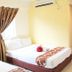 Sun Inns Hotel Lagoon in Petaling Jaya twin room with two beds and window curtains