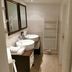 Hotel & Spa Wasserschloss Westerburg bathroom in Huy with double sinks, heated towel rail and glass shower