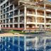 Casablanca in Obzor: 4-star hotel with outdoor pool and multi-story balconies beside a shaded pavilion