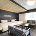 Richmond Hotel Yokohama-Bashamichi room in Yokohama with twin beds, sofa, TV and bright window