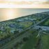 The Retreat at West Beach Parks in West Beach, aerial oceanfront view with sunset over coastline