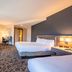Hilton Garden Inn San Diego Mission Valley Stadium guest room with two beds and sofa