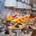 Kleopatra Dreams Beach Hotel Alanya buffet with fruit platters and hanging pendant lights