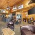 Best Western Black Hills Lodge in Spearfish bar lounge with leather chairs, tables and TVs