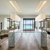 Silversands Grand Anse in St. George's with an ocean-view living area and open dining space
