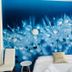 HC Resort Lignano Sabbiadoro room with blue floral wall mural, bed, chair and side table