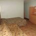 K - Town Hotel room in Katherine with two beds, TV, mini fridge and tiled floor