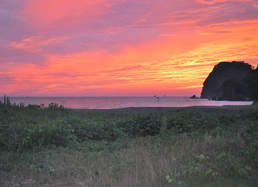 Pension Surf Rider in Nishiizu with sunset ocean view and rocky coastline