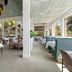 Sanctuary Resort Motor Inn in Coffs Harbour dining area with large windows and poolside seating