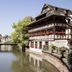 Ibis Strasbourg Centre Petite France in Strasbourg overlooking a canal with historic half-timbered buildings