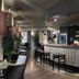 Riva del Sole Resort & Spa bar lounge in Castiglione della Pescaia with tables and bar seating