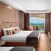 Kirman Arycanda De Luxe in Okurcalar guest room with balcony sea view and twin beds
