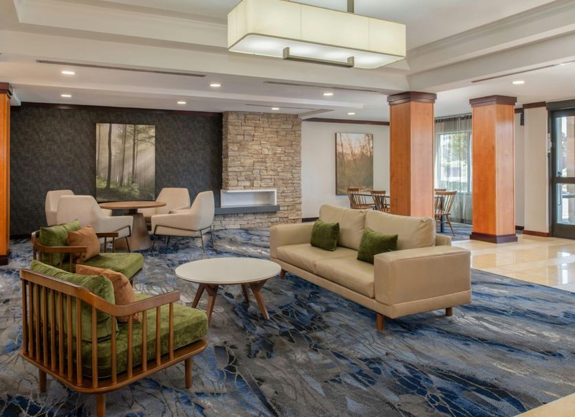 Fairfield Inn & Suites by Marriott Santa Maria lobby with seating area and stone fireplace