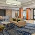 Fairfield Inn & Suites by Marriott Santa Maria lobby with seating area and stone fireplace