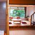 Shangrila Leisure Farm in Dongshan Township, bathroom beside a raised tatami seating area with large window view