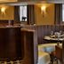 Best Western Heath Court Hotel Newmarket lounge with curved booths and table settings