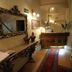 Bo - Álvares Cabral Guesthouse lobby in Porto with ornate mirror, console table and front desk