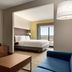 Holiday Inn Express & Suites Lexington Nw-The Vineyard By IHG guest room with king bed and balcony view