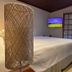 Tília Pousada de Charme in Campos do Jordão bedroom with open balcony and forest view