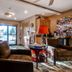 Canyon Creek in Steamboat Springs lobby with seating, Christmas tree, and glass doors to the outside