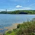 Fort Knox Inn in Bucksport with river view, bridge, and wooded shoreline