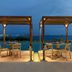 Rocabella Mykonos Hotel in Agios Stefanos with seaside dining cabanas and sunset ocean views