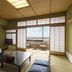 Mikuni Ocean Resort&Hotel in Sakai room with tatami seating and ocean-view balcony