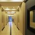 Interior corridor at 1109 The Decks at 67 Long Street, Cape Town with tiled floor and recessed lighting