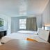 Studio 6 San Antonio, Tx - Medical Center room with two beds, TV, microwave and window in San Antonio