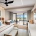 Secrets Tides Punta Cana room with two beds, balcony, and ocean view in Uvero Alto