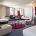 Novotel Suites Marseille Centre Euromed room with seating area and city view, Marseille
