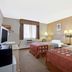 Super 8 by Wyndham Clearwater/St. Petersburg Airport room with two beds and window A/C in Clearwater