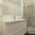 Mamma Ciccia hotel bathroom in Mandello del Lario with shower, sink and toilet