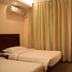 Guest room at Beijing Northern Langyue Hotel Financial Street Branch in Beijing with twin beds, curtains and TV