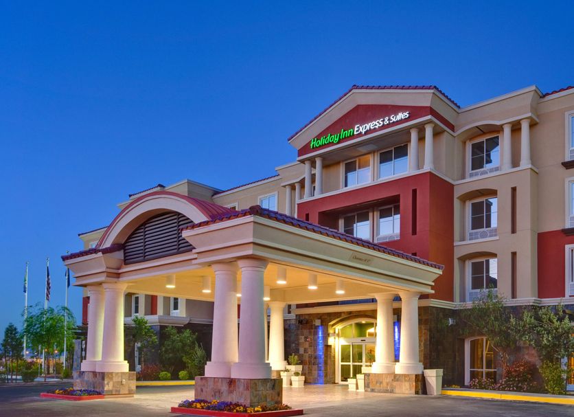 Holiday Inn Express & Suites Las Vegas Sw Springvalley By IHG exterior with lit entrance at dusk