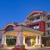 Holiday Inn Express & Suites Las Vegas Sw Springvalley By IHG exterior with lit entrance at dusk